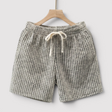 DREVAL カジュアルなチェック柄のショートパンツ